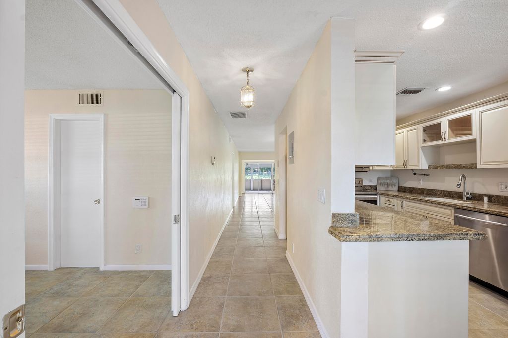 Photo of 1020 Citrus Way #101, Delray Beach, FL 33445 (MLS # B26011803)