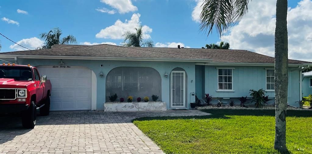 Photo of 721 SE Calmoso Drive, Port Saint Lucie, FL 34983 (MLS # R10767050)