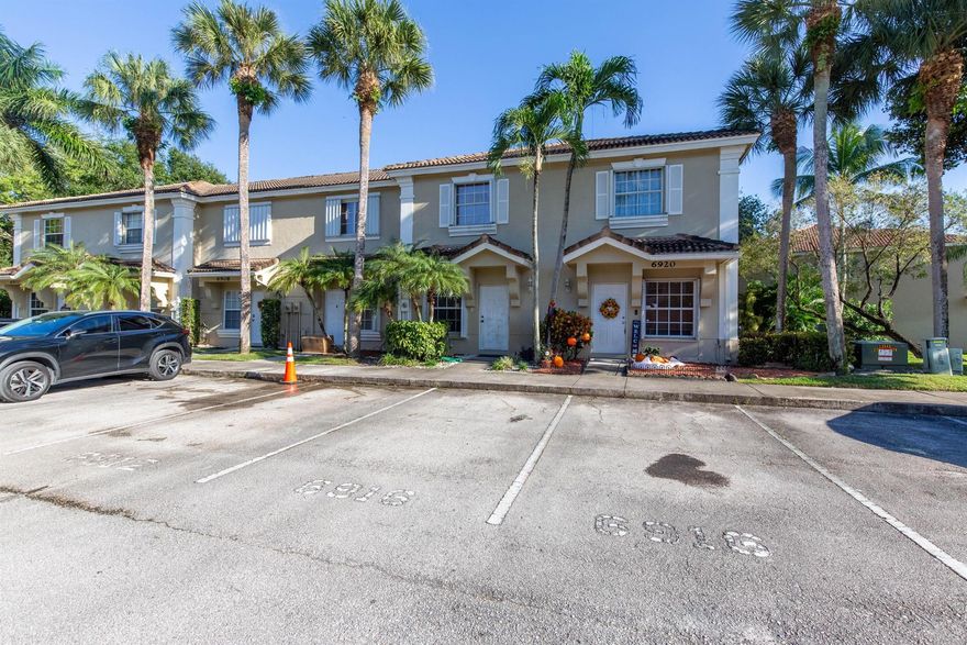 Discover effortless elegance at 6919 Crooked Fence Dr, a sunlit two-story townhome nestled in the gated  community of  Smithbrooke  in Lake Worth's premier all-ages community.  Step inside to an open-concept main level boasting a chef's kitchen with  quartz counters and stainless steel appliances, and a flowing living-dining area that opens to a private screened patio--ideal for morning coffee or evening unwinding  with views of the lake. Upstairs, the primary suite serves as a peaceful haven with an en-suite bath and walk-in closet, complemented by a generous second bedroom, full guest bath, and convenient upstairs laundry.  A powder room is located on the ground floor for your guest.  Award-Winning Education  Zoned to the acclaimed Palm Beach County School District