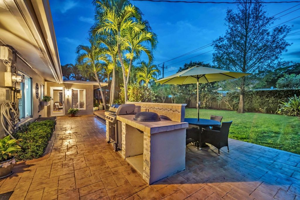 Photo of 841 Gardenia Lane, Plantation, FL 33317 (MLS # F10501447)