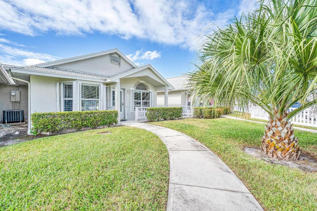 Photo of 1172 NW Lombardy Drive, Port Saint Lucie, FL 34986 (MLS # R10934894)
