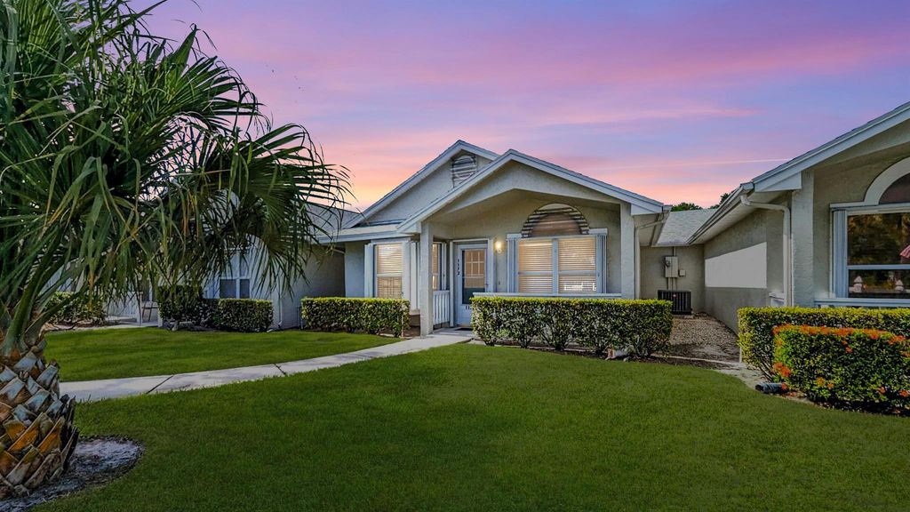 Photo of 1172 NW Lombardy Drive, Port St Lucie, FL 34986 (MLS # R10934894)