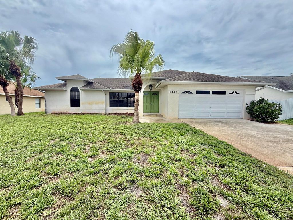 Photo of 2141 SE Floresta Drive, Port Saint Lucie, FL 34984 (MLS # R11104662)