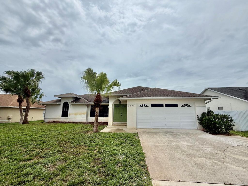 Photo of 2141 SE Floresta Drive, Port Saint Lucie, FL 34984 (MLS # R11104662)