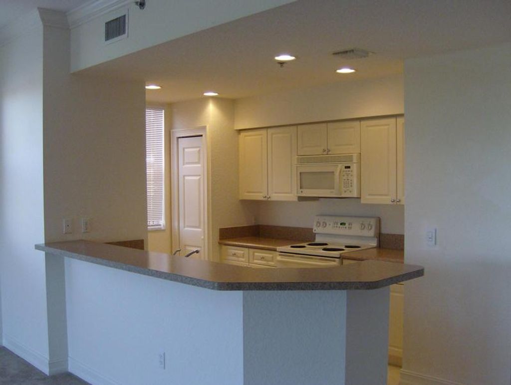 Photo of 4530 Pga Boulevard Blvd #302, Palm Beach Gardens, FL 33418 (MLS # R10703485)