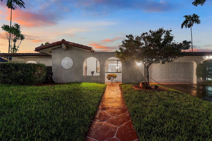 Live the Resort Lifestyle Every Day! Step into this stunningly updated home, set on an oversized 11,000 sq ft lot with lush landscaping, a sparkling pool, and peaceful lake views—your private oasis awaits! The stylish kitchen was remodeled 2023 with a gas stove. Impact windows, A/C, water heater, and tiled roof 2017, plus a flat patio roof redone in 2023, offer peace of mind. Spacious 2-car garage with fresh paint and central A/C is perfect for a workout area, workshop, or flex space. Extras include ample storage, upgraded electrical panel, newly renovated shed, cleaned underground plumbing, and PVC water pipes. Located near top-rated schools. With generous outdoor space, this property offers exciting potential for future expansion—truly a rare gem blending comfort, style, and versatility!