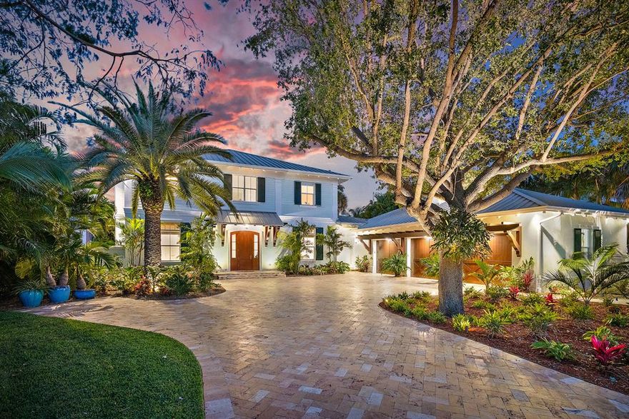 This British West Indies inspired masterpiece  is situated on an oversized estate lot on one of the best streets in the area. Located in a No Wake zone the dock has a 16,000lb and a 10,000lb lift. The dock can be altered to accommodate a large Sportfish. This tropical paradise has over 70 species of Palms, East exposure, a resort style pool and a 48KW whole house generator with 1,000ga propane tank. Built by noted builder G W Purucker Homes this home has full two-story CBS construction, a concrete slab second floor and a standing seam aluminum roof. The Chef's kitchen offers an abundance of counter space, Wolf and Subzero appliances and a gas cook top and oven.