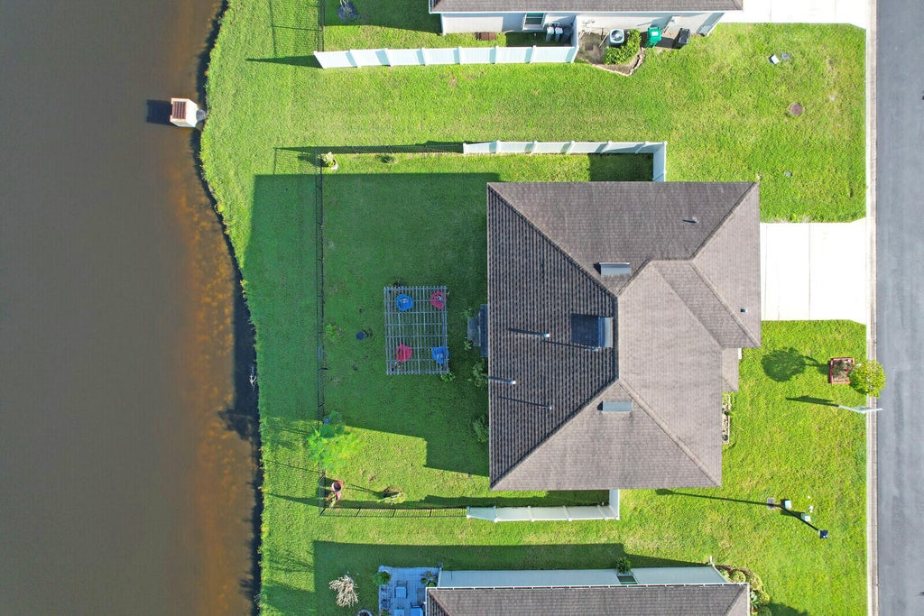Photo of 5255 Oakland Lake Circle, Fort Pierce, FL 34951 (MLS # B26073399)