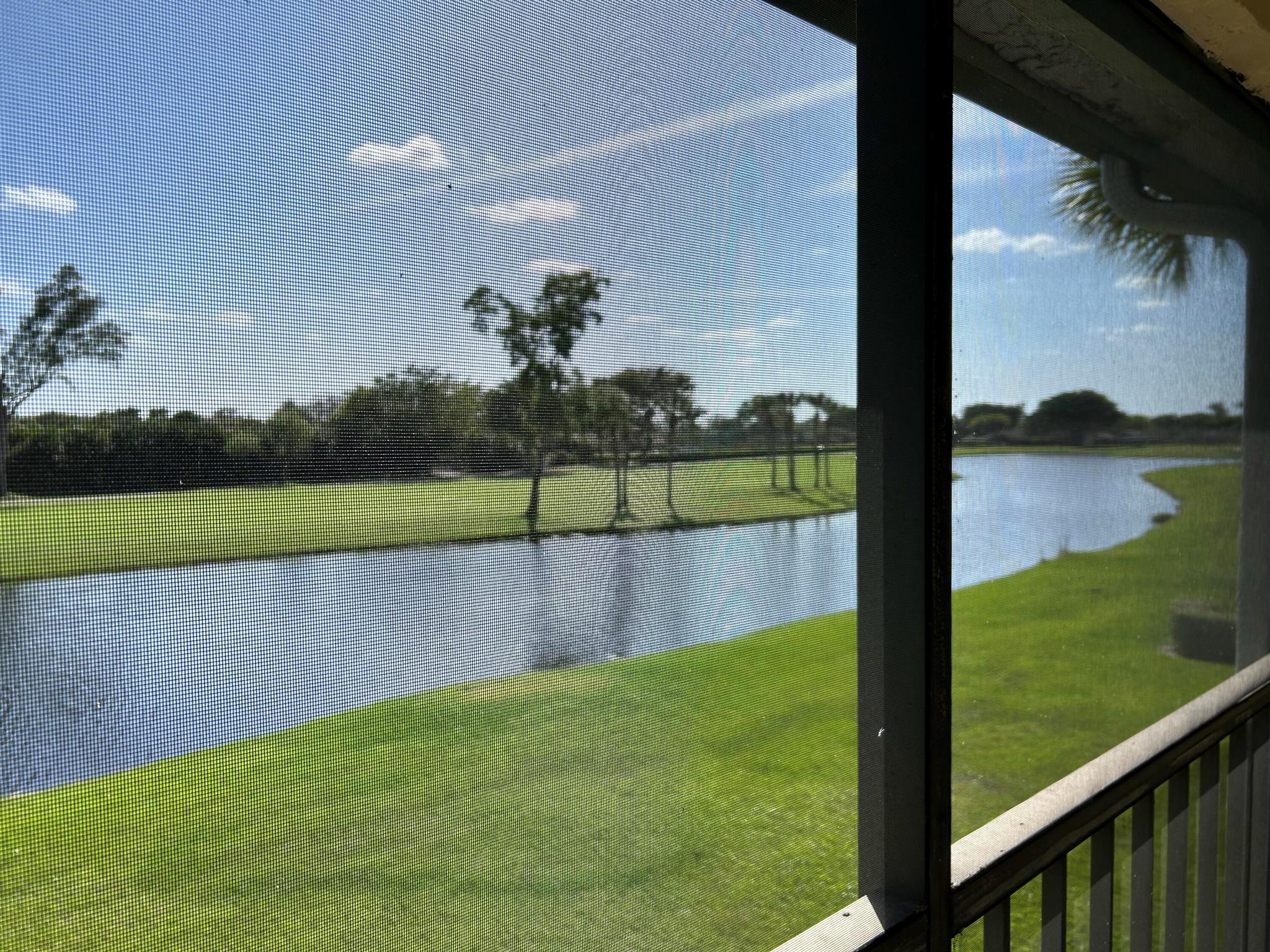 Lake and golf views from this spacious, remodeled 2nd floor unit. Open kitchen, split floor plan. Large screened balcony overlooking golf and lake. Very quiet and peaceful. Community pool, right across from the building. Membership of Boca Lago not mandatory. close tho shoppings, restaurants and highways.Don't miss showing it!