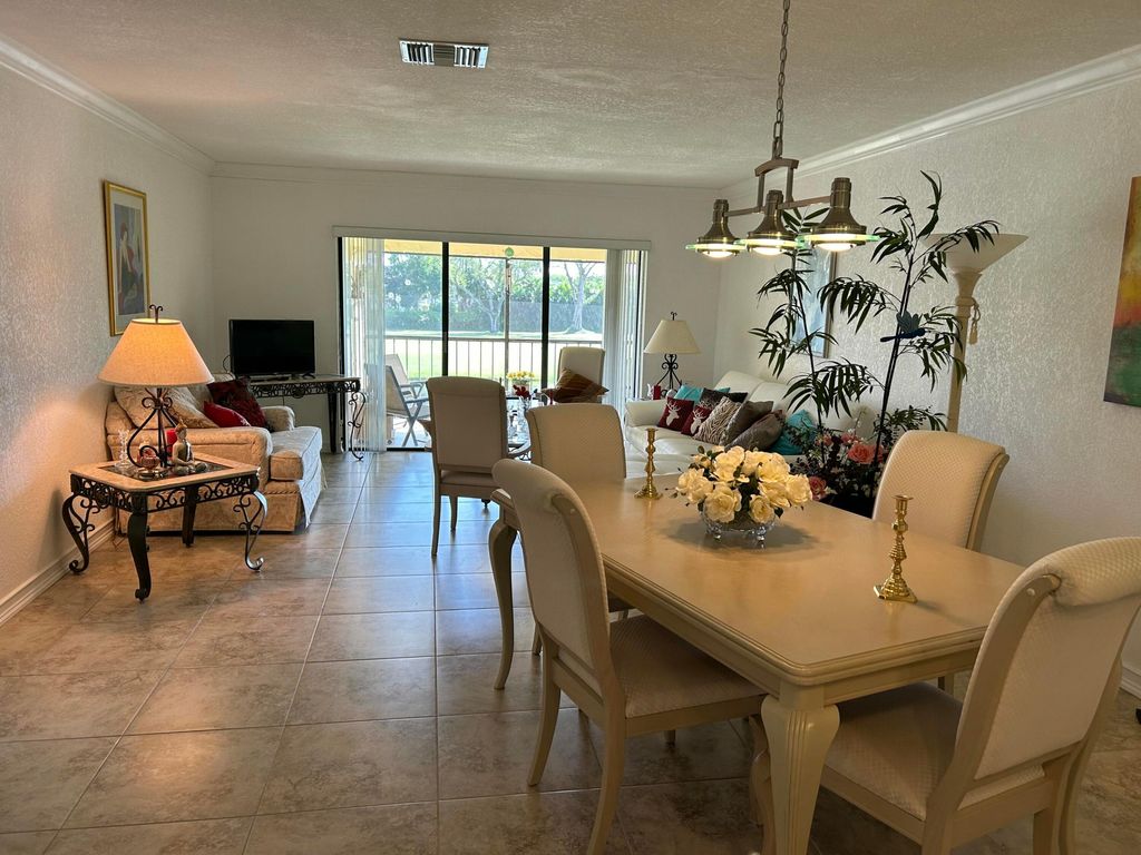 Photo of 21535 Cypress Hammock 36f Drive #36f, Boca Raton, FL 33428 (MLS # R11120612)