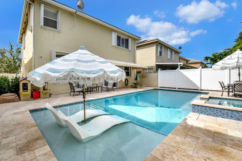 Photo of 4271 N Magnolia Circle, Delray Beach, FL 33445 (MLS # R11036965)
