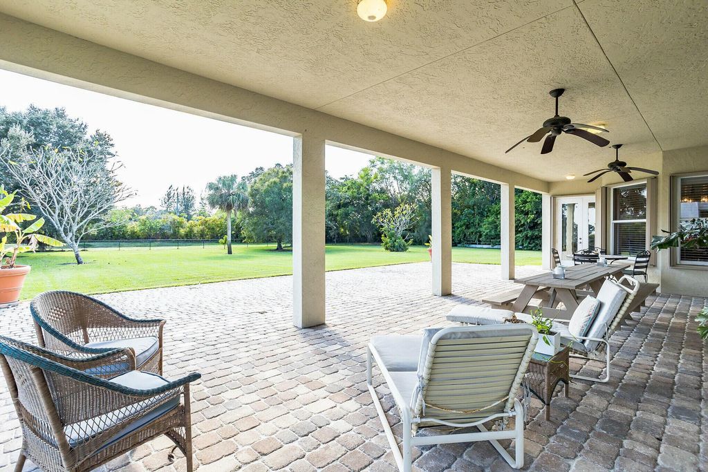 Photo of 8139 Man O War Road, Palm Beach Gardens, FL 33418 (MLS # R10847042)