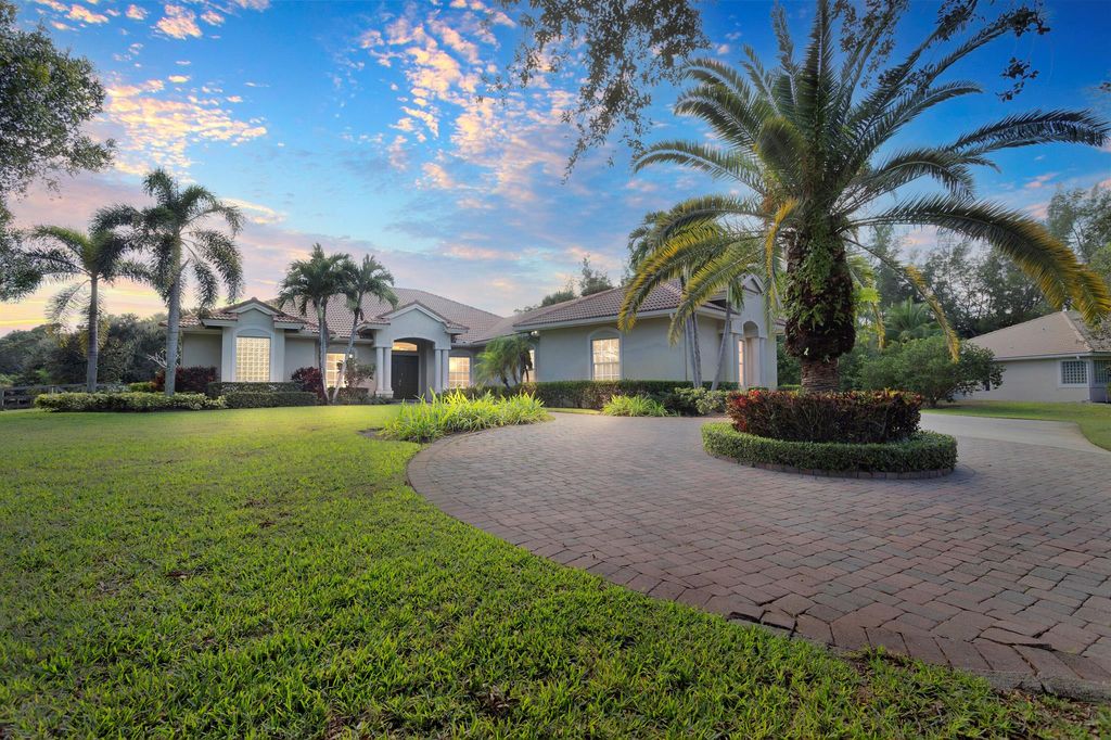 Photo of 8139 Man O War Road, Palm Beach Gardens, FL 33418 (MLS # R10847042)