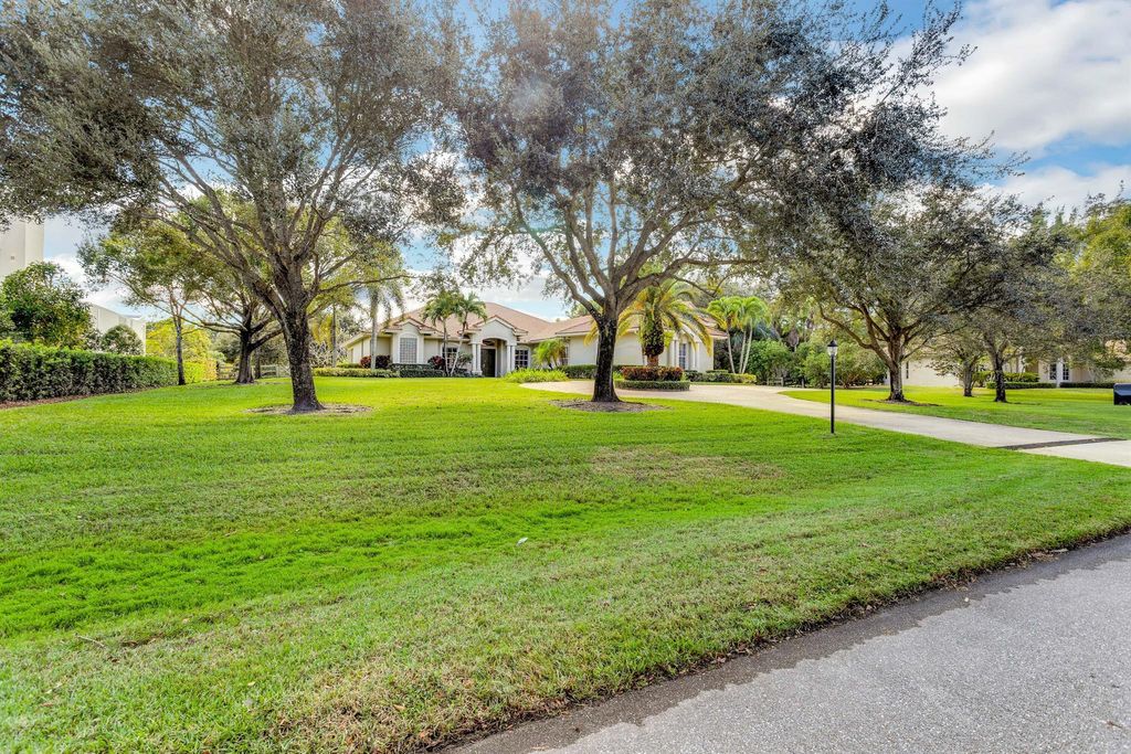 Photo of 8139 Man O War Road, Palm Beach Gardens, FL 33418 (MLS # R10847042)
