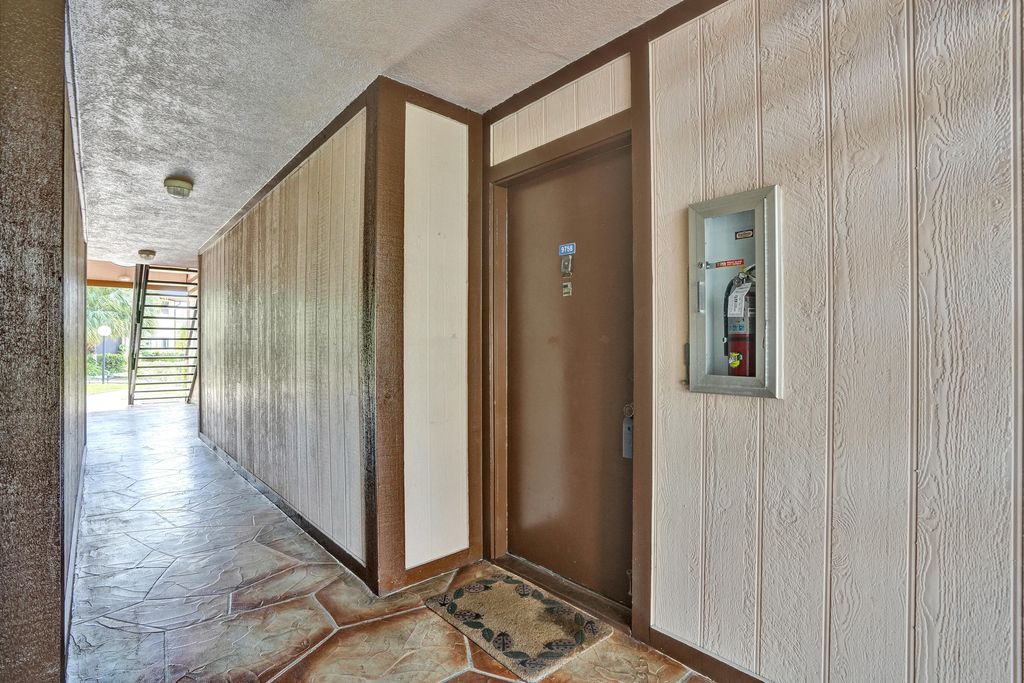 Photo of 9758 N Belfort Circle #110, Tamarac, FL 33321 (MLS # B26022466)