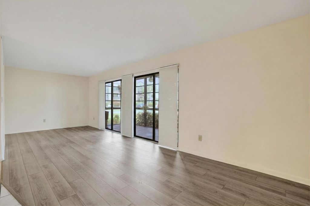 Photo of 9758 N Belfort Circle #110, Tamarac, FL 33321 (MLS # B26022466)
