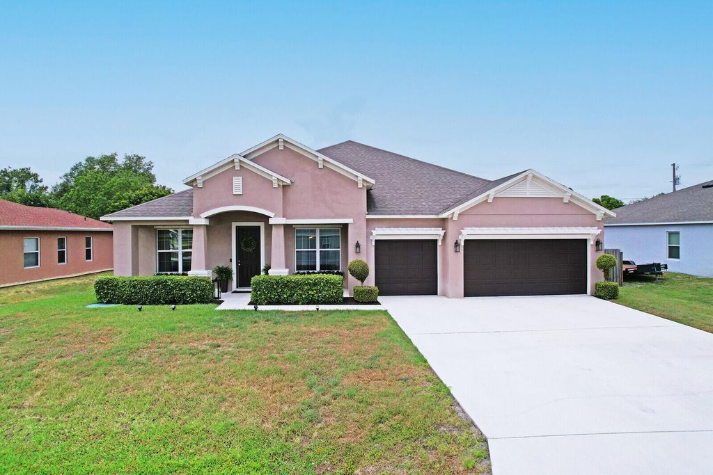 Photo of 4052 SW Mccandless Street, Port Saint Lucie, FL 34953 (MLS # R11089917)