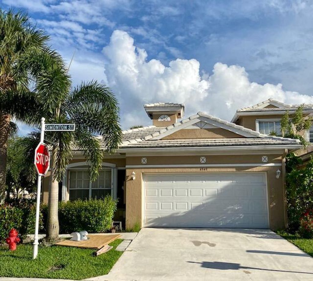 Photo of 4949 Simonton Street, Lake Worth, FL 33463 (MLS # R10895156)