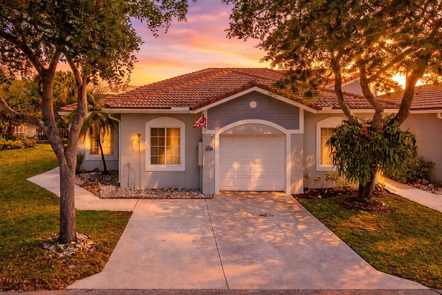 Welcome to this beautifully maintained corner home in the sought-after Waterways community in Deerfield Beach! This light-filled residence offers the perfect blend of comfort, style, and functionality. The spacious kitchen features stainless steel appliances, granite countertops and ample counter space, making it ideal for both everyday living and entertaining guests. The thoughtfully designed split bedroom floor plan provides added privacy, perfect for families or hosting overnight visitors. Enjoy peace of mind with a brand new A/C system, roof from 2019 and full hurricane shutters throughout the home. Designed for easy, low-maintenance living, this home features no carpet—just elegant vinyl and tile flooring throughout. Step outside to your screened-in patio, the perfect space to relax, unwind, or enjoy your morning coffee while taking in the Florida breeze. Additional highlights include a one-car garage with a two-car driveway, offering plenty of parking for you and your guests. As a corner unit, the home provides extra privacy and added outdoor space. Conveniently located near shopping, dining, major highways, and just a short drive to South Florida's beautiful beaches. Don't miss the opportunity to make it yours!