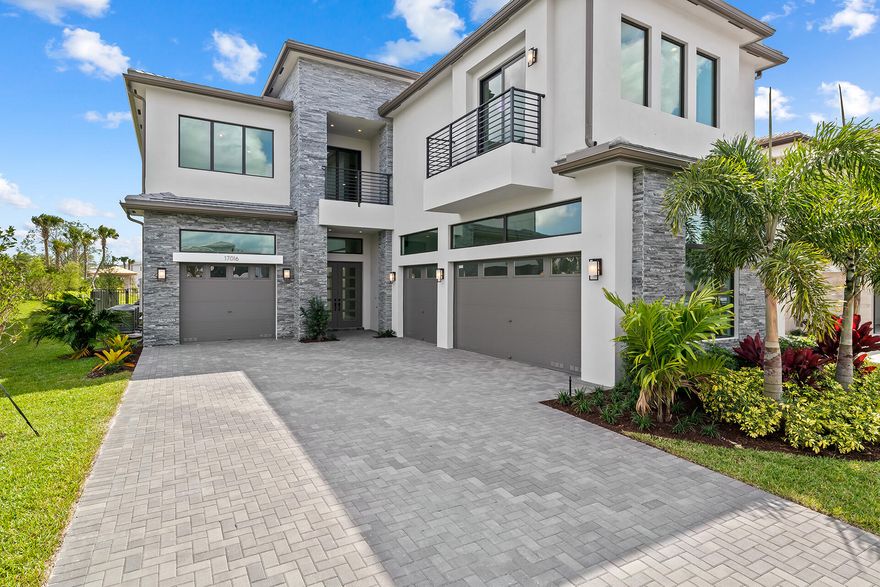 Welcome home to this brand new contemporary Palma model located on wide water and a cul de sac in Boca Bridges. Enjoy your outside southern exposure. This home features 5,508 sq/ft under air, a 4 car garage, custom swimming pool, gas stove, stainless steel appliance, 5 beds 6 baths plus a clubroom, a media room/den, and a loft. Construction was just completed and it is ready to move in! Boca Bridges is the newest and most luxurious gated community developed by GL Homes. The 27,000 sq/ft clubhouse located on 7 acres is equipped with resort style amenities including tennis courts, a pool, game / card rooms, fitness studio, gym, indoor basketball court, spa services and a gourmet restaurant.