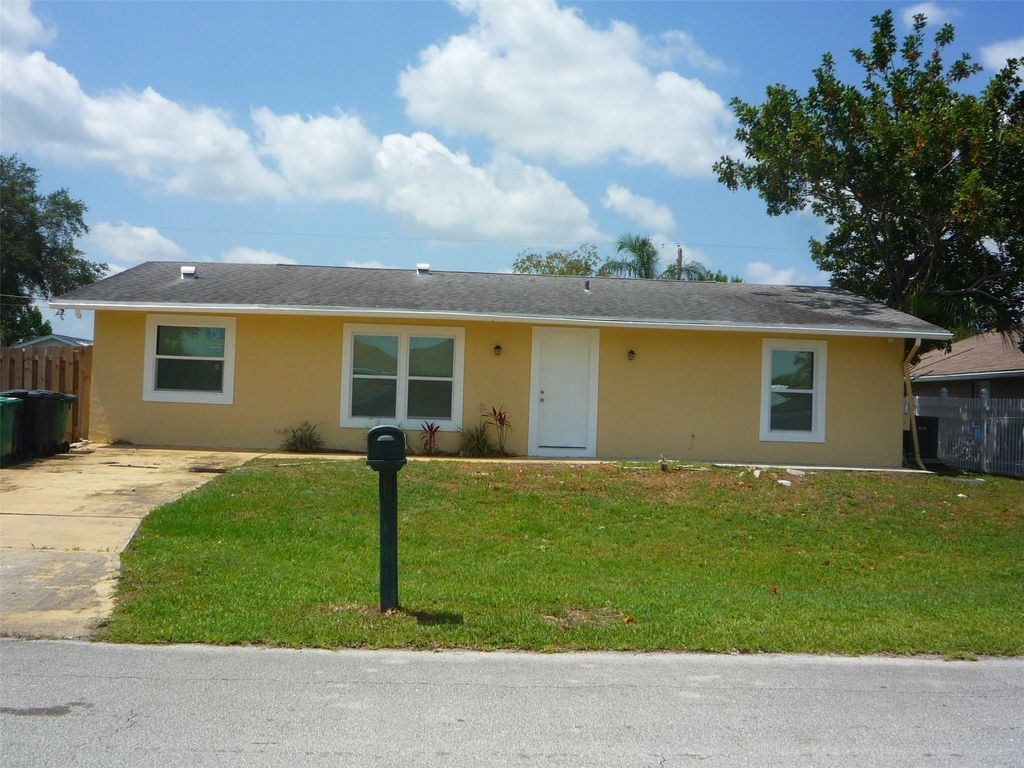 Photo of 316 NW Placid Avenue, Port Saint Lucie, FL 34983 (MLS # F10441989)