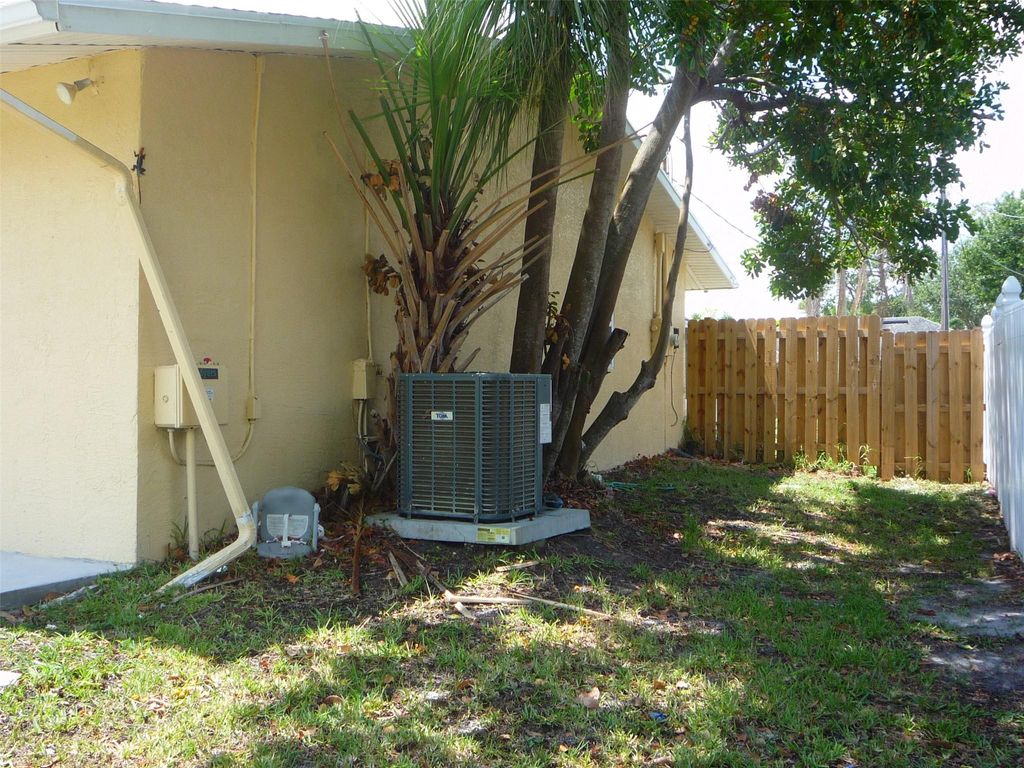 Photo of 316 NW Placid Avenue, Port Saint Lucie, FL 34983 (MLS # F10441989)