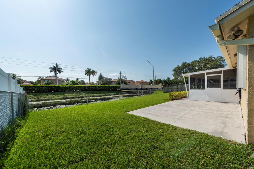 Photo of 2101 NW 101st Terrace, Pembroke Pines, FL 33026 (MLS # B26026709)