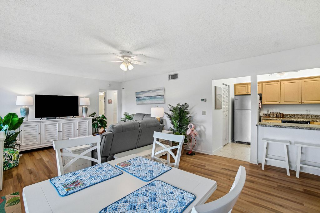 Photo of 302 Knotty Pine Circle #A-2, Greenacres, FL 33463 (MLS # R11159188)