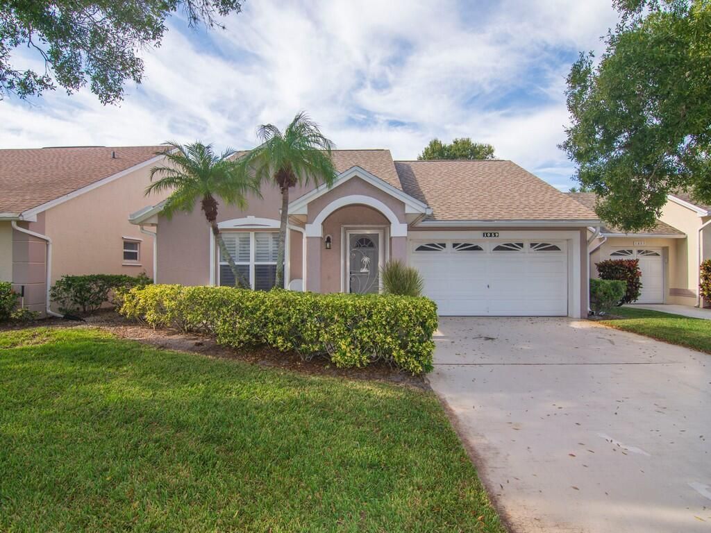 Photo of 1059 NW Tuscany Drive, Port Saint Lucie, FL 34986 (MLS # R10938222)