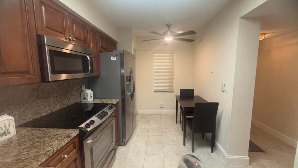 Photo of 6866 HUNTINGTON Lane #504, Delray Beach, FL 33446 (MLS # B26055160)