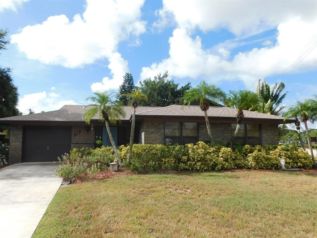 Photo of 1102 SE Petunia Avenue Ave, Port Saint Lucie, FL 34952 (MLS # R10823492)