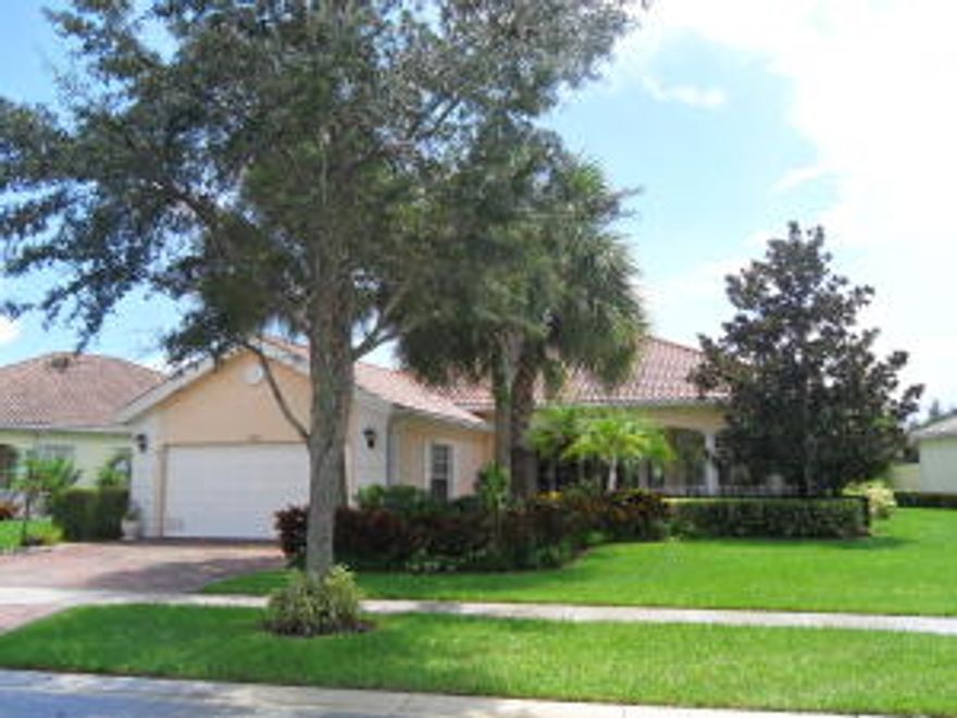 IMMACULATE CARLYLE MODEL WITH A SCREENED COVERED PATIO & POOL LOCATED ON A PREMIUM LAKE LOT WITH NO REAR NEIGHBORS & BEAUTIFUL UPGRADES * SIT IN YOUR COVERED FRONT PORCH READING THE NEWSPAPER OR A GOOD BOOK * FRONT SCREENED ENTRY WITH AN EXPANDED DRIVEWAY * PORCELAIN MARBLE LIKE TILES THRU OUT THE ENTIRE LIVING AREA WITH WOOD FLOORING IN ALL BEDROOMS * NO CARPET * NEW HIGH EFFICIENCY A/C UNIT * CORION COUNTERTOPS WITH FULL TUMBLE MARBLE BACKSPLASH * LOVELY CROWN AND DECORATIVE MOLDING THRU-OUT HOME * FRONT LOAD GARAGE FOR EASY ACCESS * CENTRAL VACUUM * CLOSET  ORGANIZERS IN ALL CLOSETS * UPGRADED LANDSCAPING * THIS HOME IS LOCATED IN THE ONLY RESORT STYLE COMMUNITY IN ALL OF WELLINGTON VILLAGEWALK * AMENITIES INCLUDE 24 HR. MANNED GATE & PRIVATE SECURITY PATROL,   CLUBHOUSE WITH STATE OF THE ART EXERCISE ROOM, CATERING KITCHEN & HALL, LIBRARY, CARD ROOMS AND MEETING ROOMS * IT ALSO CONSISTS OF A TOWN CENTER WITH A REAL ESTATE OFFICE, A BEAUTY & NAIL SALON AND A POST OFFICE * TENNIS, BASKETBALL & BOCCE BALL COURTS, A HEATED LAP POOL & A HEATED RESORT STYLE POOL AND A CHILDREN'S PLAY AREA * MILES OF BEAUTIFUL WALKING PATHS & BRIDGES AND LOVELY PRESERVE AREAS * SHOW YOUR FUSSIEST CLIENTS THEY WON'T BE DISAPPOINTED !! VILLAGEWALK IS LOCATED CLOSE TO WELLINGTONS "A" RATED SCHOOLS, POLO AND EQUESTRIAN CLUBS, THE NEW TENNIS PAVILION, PARKS, GOLF, BEACHES, WELLINGTON GREEN MALL, FINE SHOPS AND RESTAURANTS, HOSPITALS, DOWNTOWN WEST PALM BEACH AND ONLY 20 MINUTES TO THE PALM BEACH INTERNATIONAL AIRPORT * PRIME LOCATION * DON'T PASS THIS ONE UP!!