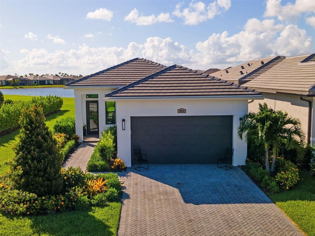 Photo of 9012 SW Vetta Way, Port Saint Lucie, FL 34987 (MLS # F10542032)