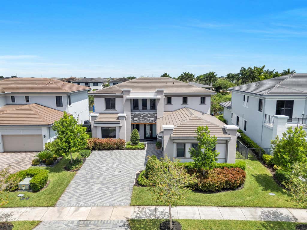 Photo of 10675 Coral Street, Parkland, FL 33076 (MLS # B26063304)