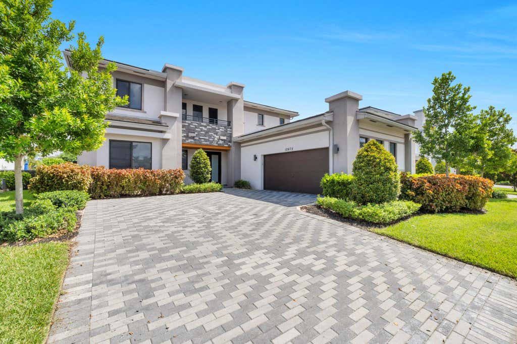 Photo of 10675 Coral Street, Parkland, FL 33076 (MLS # B26063304)