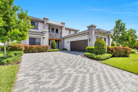 Photo of 10675 Coral Street, Parkland, FL 33076 (MLS # B26063304)