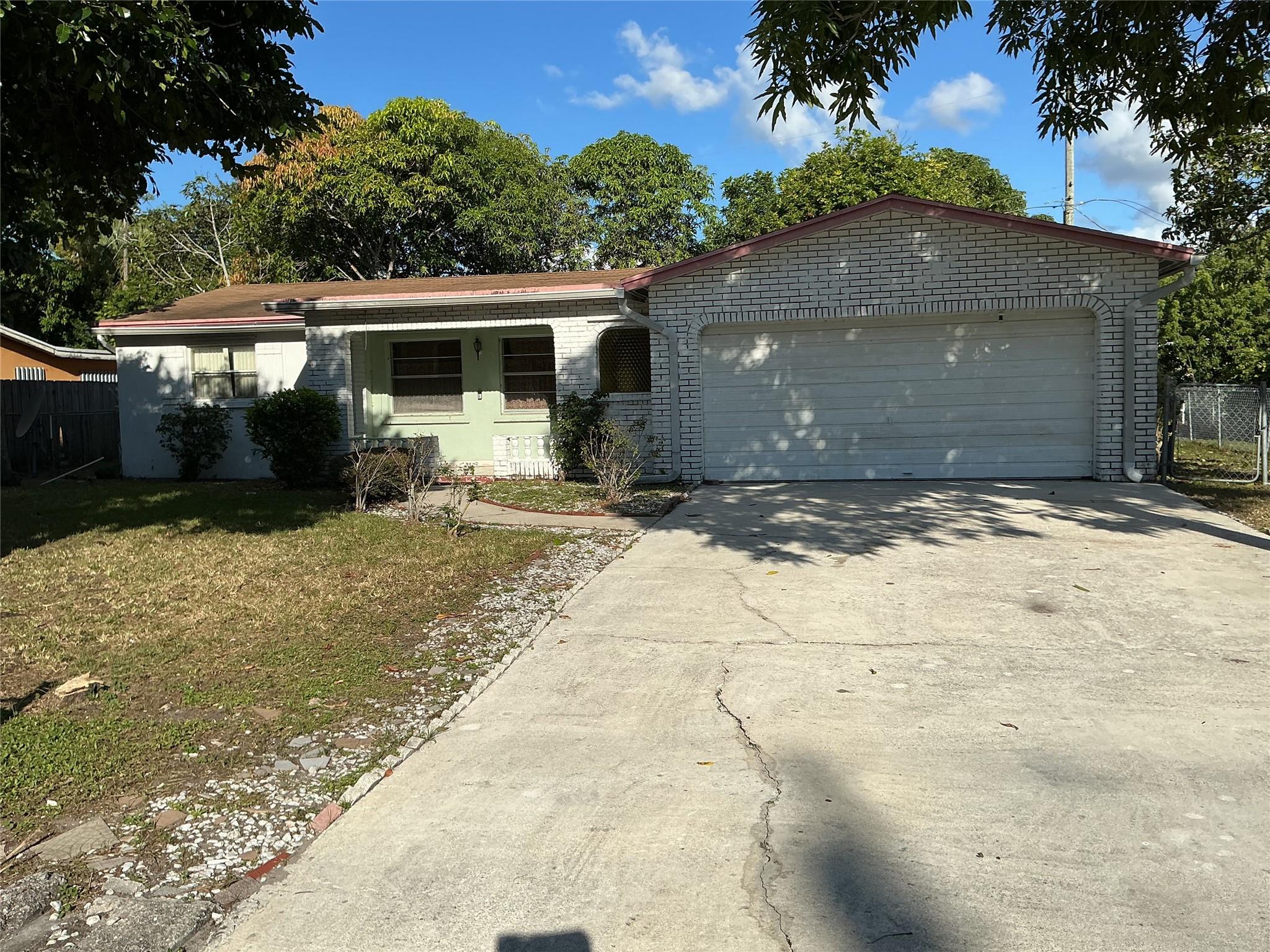 Investor special or ideal fixer-upper opportunity! This solid CBS home offers great potential in a desirable West Palm Beach location near the Intracoastal. The property needs updates including new windows, roof, A/C, water heater, and baseboards—ready for your vision and renovation. Conveniently located near downtown, shopping, and major highways. Bring your contractor and explore the possibilities!