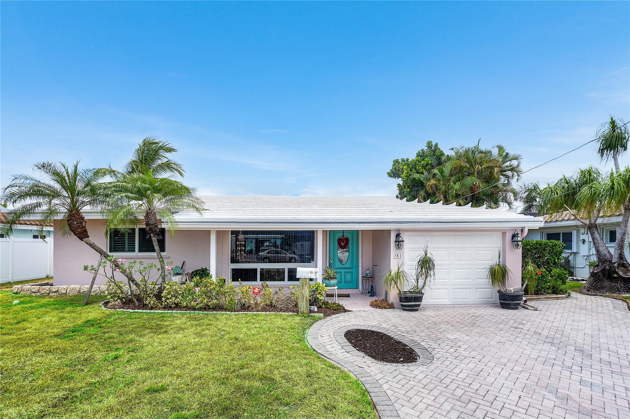 Secluded in east Pompano Beach, this waterfront haven offers 70 feet of canal frontage with Intracoastal access. Nestled on a private street, the 1764-square-foot home features two bedrooms and one bathroom. It’s a perfect canvas to create your dream coastal retreat. Imagine water-view living spaces, and a revamped patio by the private dock. The lot invites a pool and a lush garden of fruit trees. Priced for its potential, this rare gem won’t last. Schedule a tour today to envision your paradise!