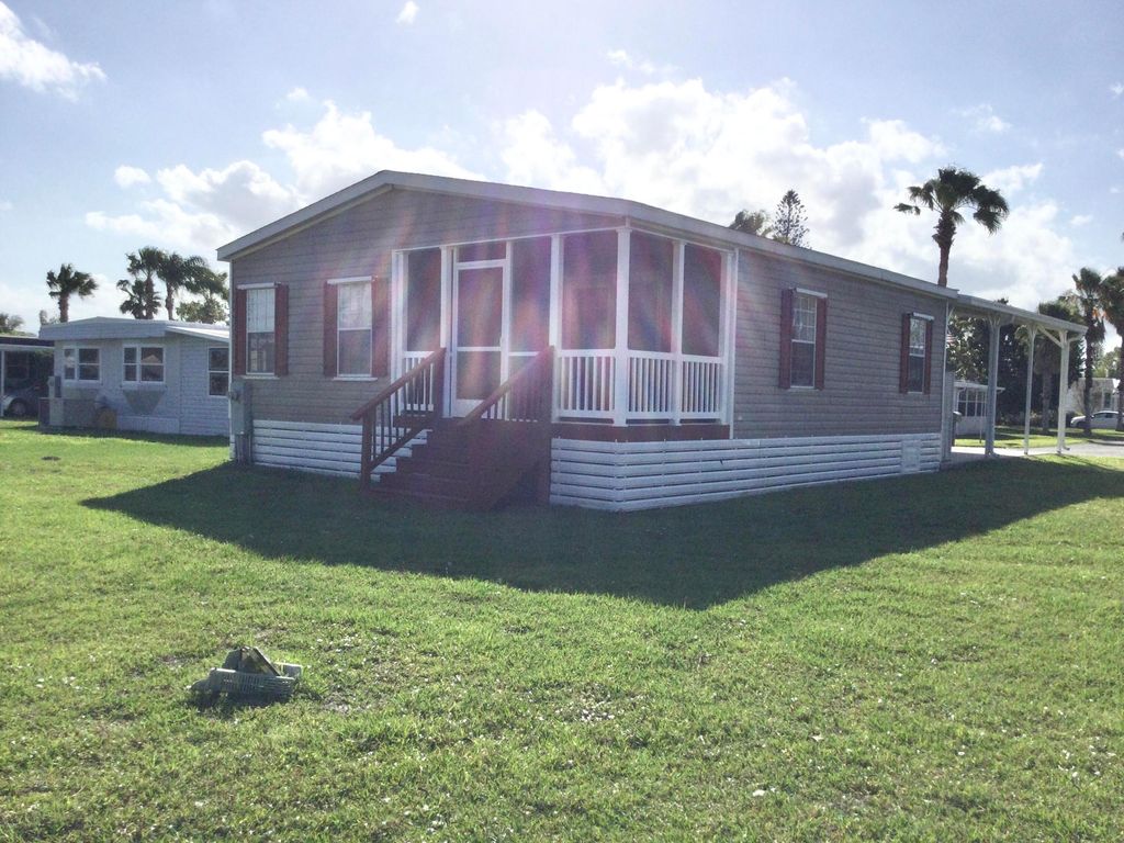 Photo of 52 Mediterranean Boulevard E, Port Saint Lucie, FL 34952 (MLS # R11078945)