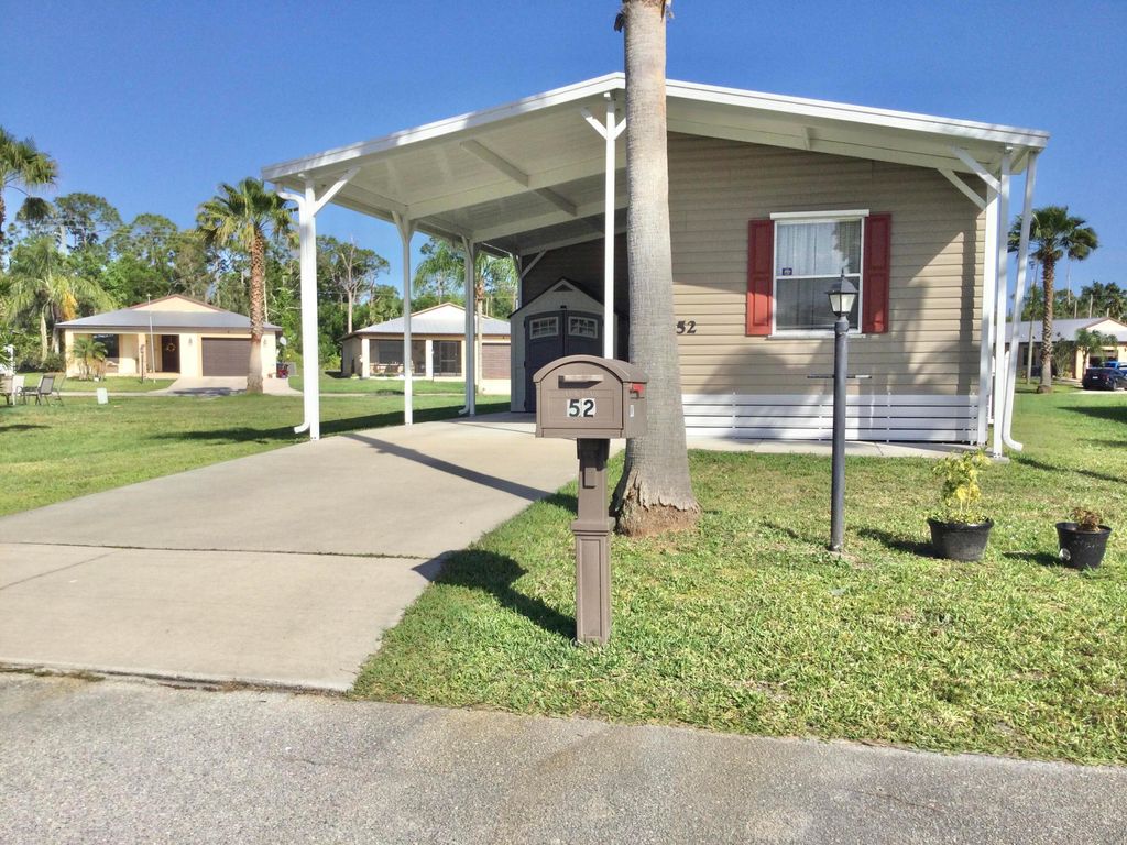 Photo of 52 Mediterranean Boulevard E, Port Saint Lucie, FL 34952 (MLS # R11078945)