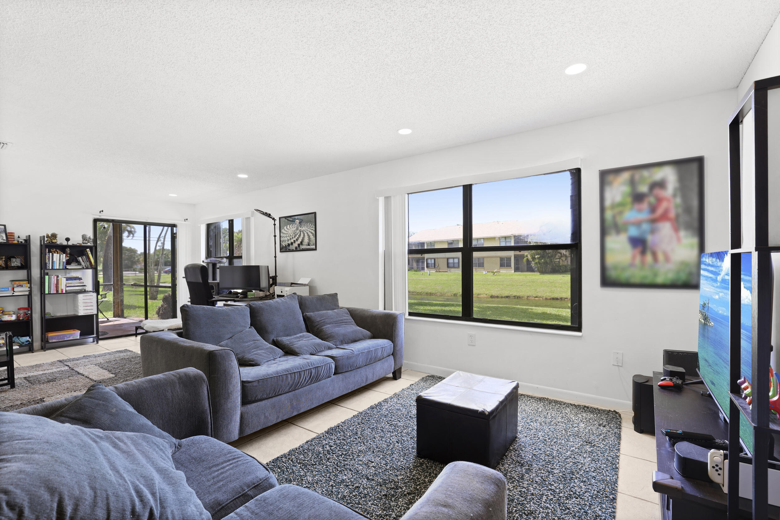 SHEFFIELD WOODS AT WELLINGTON CONDO - Residential