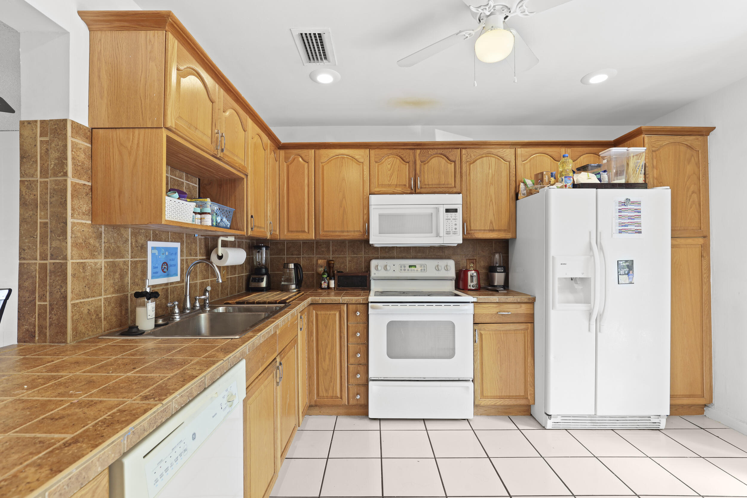 SHEFFIELD WOODS AT WELLINGTON CONDO - Residential