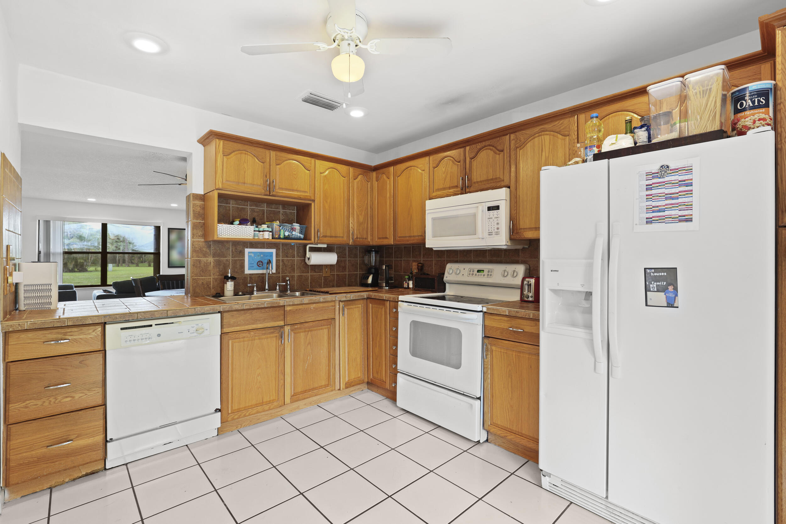 SHEFFIELD WOODS AT WELLINGTON CONDO - Residential