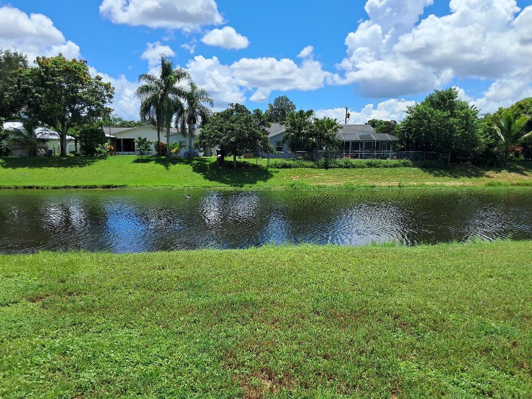 Home on C-24 Canal, recently remodeled. split floor plan, Large covered screen patio, Bonus in-law suite.