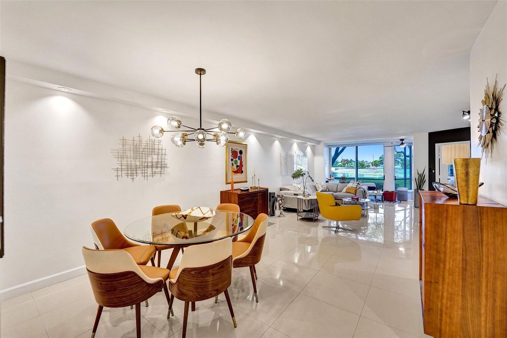 Photo of 3090 N Course Drive #108, Pompano Beach, FL 33069 (MLS # F10500609)