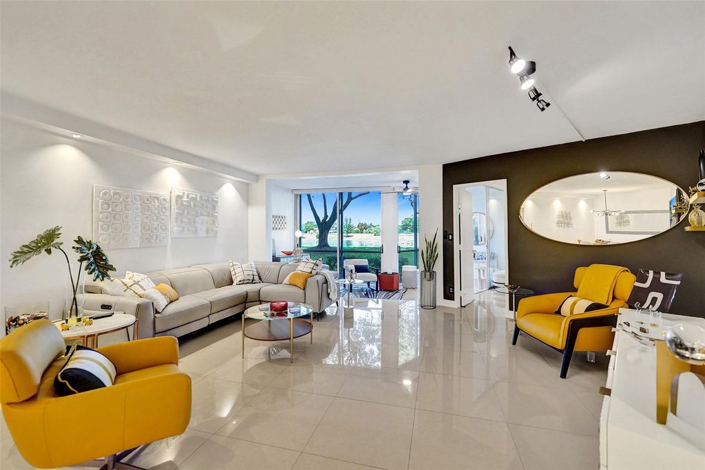 Photo of 3090 N Course Drive #108, Pompano Beach, FL 33069 (MLS # F10500609)