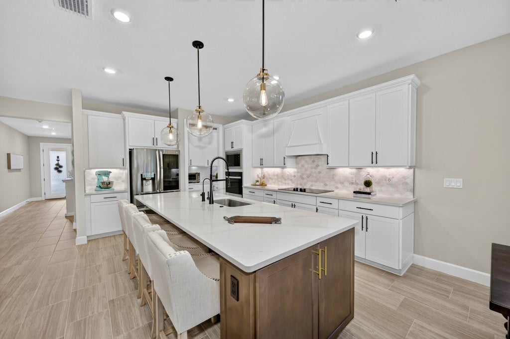 Photo of 3862 White Alder Way, Vero Beach, FL 32967 (MLS # B26047758)