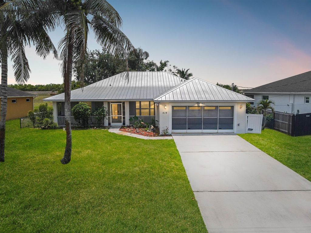 Photo of 419 SW Kestor Drive, Port Saint Lucie, FL 34953 (MLS # R10982721)