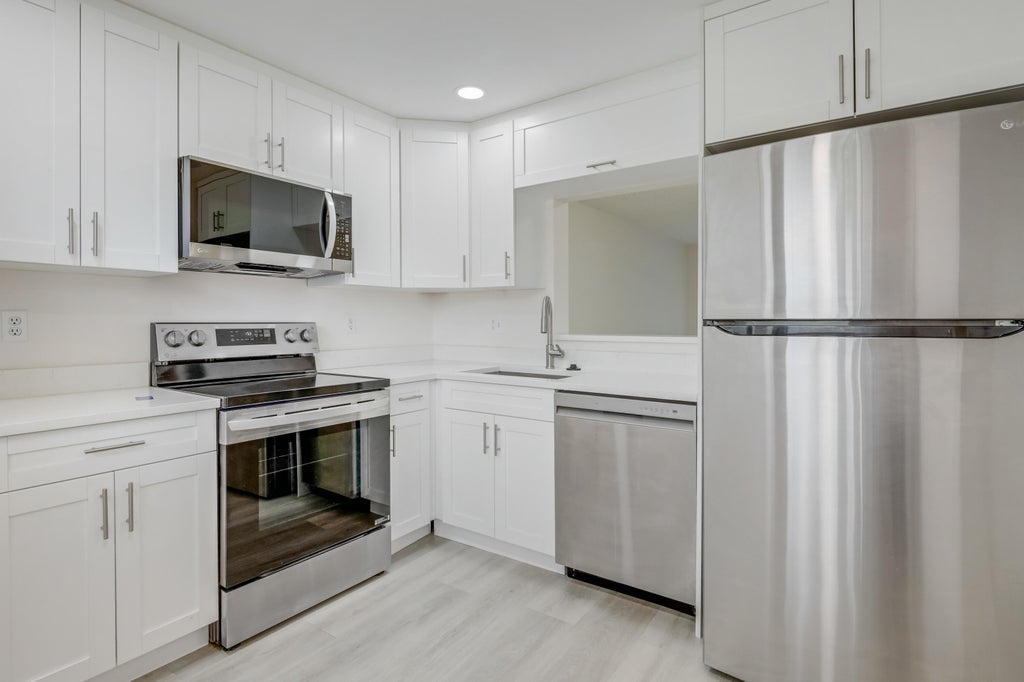 Photo of 3595 Birdie Drive #103, Lake Worth, FL 33467 (MLS # R11125324)