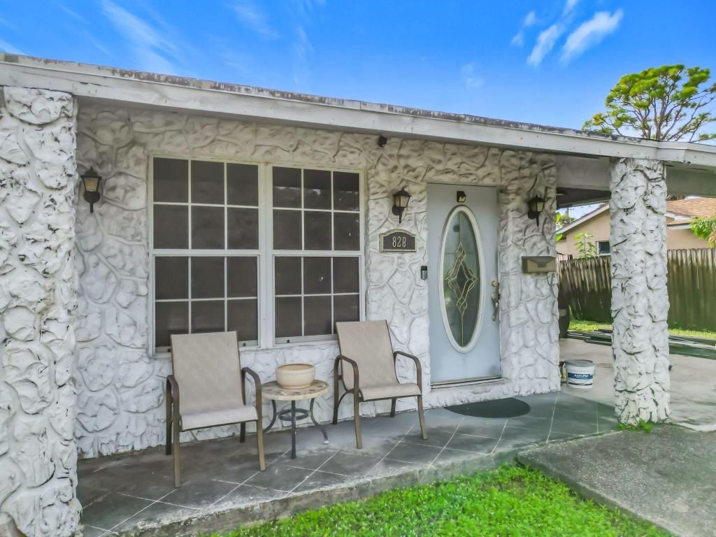 Photo of 828 Northern Drive, Lake Park, FL 33403 (MLS # R11146253)